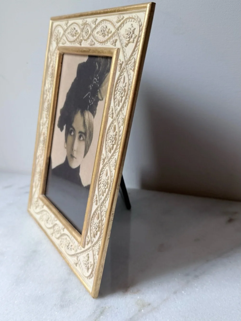 White metal decorative picture frame with gold accents
